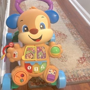 Baby walker. Perfect for little one’s learning to walk and balance. Plays music